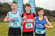 11 February 2016; Second place Paul Hartnett, left, Colaiste an Chraoibhin Fermot, first place Ted Collins, centre, Glenstal Abbey School, and third place Mark Hanrahan, right, St Flannans Ennis, hold their medals following the Minor Boys event. GloHealth Munster Schools Cross Country, Tramore Valley Park, Cork City. Picture credit: Seb Daly / SPORTSFILE