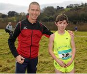 11 February 2016; Junior Boys event winner Chris O'Reilly, right, Douglas Community School, is presented with his medal by Republic of Ireland athlete Rob Heffernan following the race. GloHealth Munster Schools Cross Country, Tramore Valley Park, Cork City. Picture credit: Seb Daly / SPORTSFILE