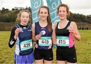 11 February 2016; Second place Claire Rafter, left, Ursuline Waterford, first place Tamzin Muldowney, centre, St Marys Midleton, and third place Sasha Brent, right, Tarbert CS, hold their medals following the Intermediate Girs event. GloHealth Munster Schools Cross Country, Tramore Valley Park, Cork City. Picture credit: Seb Daly / SPORTSFILE