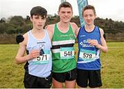 11 February 2016; Second place Darragh McElhinney, left, Colaiste Pobail Bheanntrai, first place Charlie O'Donovan, centre, Colaiste Chroist Ri, and third place Donal Devane, right, St Flannans Ennis, hold their medals following the Intermediate Boys event. GloHealth Munster Schools Cross Country, Tramore Valley Park, Cork City. Picture credit: Seb Daly / SPORTSFILE