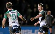 11 February 2016; Matt Healy, Connacht, celebrates scoring his sides first try of the match with team-mate AJ MacGinty. Guinness PRO12 Round 14, Newport Gwent Dragons v Connacht. Rodney Parade, Newport, Wales. Picture credit: Chris Fairweather / SPORTSFILE