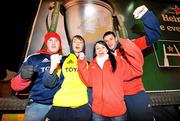 11 December 2009; Munster supporters, from left, Tomas McCoy, Eoin McCoy, Katie Higgins and John Higgins, from Limerick, ahead of their side's Heineken Cup match against Perpignan. Thomond Park, Limeirck. Picture credit: Diarmuid Greene / SPORTSFILE