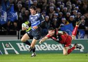 12 December 2009; Shane Horgan, Leinster, goes past the flying tackle of Ken Owens to score the first try of the game against Llanelli Scarlets. Heineken Cup Pool 6 Round 3, Llanelli Scarlets v Leinster, Parc Y Scarlets, Llanelli, Wales. Picture credit: Matt Browne / SPORTSFILE