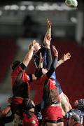 12 December 2009; Leo Cullen, Leinster, takes the ball in the lineout ahead of Dominic Day and Lou Reed, Llanelli Scarlets. Heineken Cup Pool 6 Round 3, Llanelli Scarlets v Leinster, Parc Y Scarlets, Llanelli, Wales. Picture credit: Matt Browne / SPORTSFILE