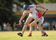 12 December 2009; Brian Hogan, 2009 All-Stars, is tackled by his Kilkenny team-mate Martin Comerford, 2008 All-Stars. GAA Hurling All-Stars Tour 2009, sponsored by Vodafone, 2008 All-Stars (red) v 2009 All-Stars (white), Hurlingham Hurling Club, Hurlingham, Buenos Aires, Argentina. Picture credit: Ray McManus / SPORTSFILE