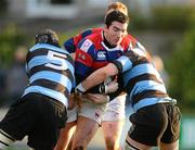 12 December 2009; Peter O'Brien, Clontarf, is tackled by Fergal Walsh, left, and Paddy Butler, Shannon. AIB League Division 1A, Clontarf v Shannon, Castle Avenue, Clontarf, Dublin. Picture credit: Stephen McCarthy / SPORTSFILE