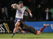 11 February 2016; Bundee Aki, Connacht, is tackled by Adam Warren, Newport Gwent Dragons. Guinness PRO12 Round 14, Newport Gwent Dragons v Connacht. Rodney Parade, Newport, Wales. Picture credit: Gareth Everett / SPORTSFILE