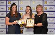 1 June 2016; Clodagh Fox, Wicklow, centre, receives her Division 4 Lidl Ladies Team of the League Award from Aoife Clarke, head of communications, Lidl Ireland, left, and Marie Hickey, President of Ladies Gaelic Football, right, at the Lidl Ladies Teams of the League Award Night. The Lidl Teams of the League were presented at Croke Park with 60 players recognised for their performances throughout the 2016 Lidl National Football League Campaign. The 4 teams were selected by opposition managers who selected the best players in their position with the players receiving the most votes being selected in their position. Croke Park, Dublin. Photo by Cody Glenn/Sportsfile