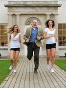 15 December 2009; Former Ireland rugby captain Keith Wood with models Sarah Morrissey and Baiba Gaile, right, at the launch of Fitfone. Keith Wood Launches Fitfone, NOVA Campus, UCD, Dublin. Photo by Sportsfile