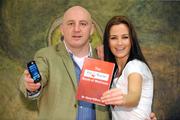 15 December 2009; Former Ireland rugby captain Keith Wood with model Baiba Gaile at the launch of Fitfone. Keith Wood Launches Fitfone, NOVA Campus, UCD, Dublin. Photo by Sportsfile