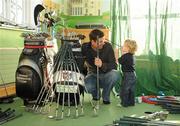 17 December 2009; Padraig Harrington pictured with his son Ciaran, age 2, at his home with clubs and equipment which is to be sold in Dundrum Shopping Centre this Saturday to raise funds for GOAL. Rathmichael, Dublin. Picture credit: Pat Murphy / SPORTSFILE