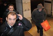 18 December 2009; Stade Francais' players and officials including Julien Dupuy, behind left, and David Attoub, right, arrive ahead of an ERC Independent Disciplinary Committee hearing. ERC Offices, Huguenot House, Stephen's Green, Dublin. Picture Credit: Brian Lawless / SPORTSFILE
