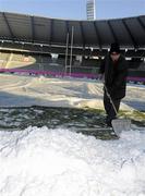 19 December 2009; Ground staff on the frozen pitch during an inspection. Heineken Cup Pool 4 Round 4, Stade Francais v Ulster, King Baudoun Stadium, Brussels, Belgium. Picture credit: Oliver McVeigh / SPORTSFILE