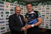 19 December 2009; Jamie Heaslip, Leinster, is presented with his Heineken Man of the Match award by Pat Maher, National Sponsorship and Events Manager, Heineken Ireland. Heineken Cup Pool 6 Round 4, Leinster v Llanelli Scarlets, RDS, Dublin. Picture credit: Matt Browne / SPORTSFILE