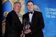 19 December 2009; John Rogers, Carlow, is presented with his Christy Ring Award by Uachtarán CLG Criostóir Ó Cuana. Christy Ring/Nicky Rackard/Lory Meagher Champion 15 & Rounder All-Star Awards 2009, Croke Park, Dublin. Photo by Sportsfile