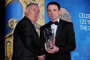 19 December 2009; James Hickey, Carlow, is presented with his Christy Ring Award by Uachtarán CLG Criostóir Ó Cuana. Christy Ring/Nicky Rackard/Lory Meagher Champion 15 & Rounder All-Star Awards 2009, Croke Park, Dublin. Photo by Sportsfile