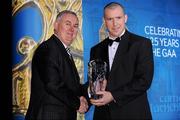 19 December 2009; Fintan Conway, Down, is presented with his Christy Ring Award by Uachtarán CLG Criostóir Ó Cuana. Christy Ring/Nicky Rackard/Lory Meagher Champion 15 & Rounder All-Star Awards 2009, Croke Park, Dublin. Photo by Sportsfile