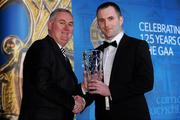 19 December 2009; Ruari McGrattan, Down, is presented with his Christy Ring Award by Uachtarán CLG Criostóir Ó Cuana. Christy Ring/Nicky Rackard/Lory Meagher Champion 15 & Rounder All-Star Awards 2009, Croke Park, Dublin. Photo by Sportsfile