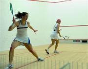 20 December 2009; Aisling Blake in action against Madeline Perry, right, during the Irish Squash National Championships Finals. Fitzwilliam Lawn Tennis Club, Dublin. Picture credit: Pat Murphy / SPORTSFILE