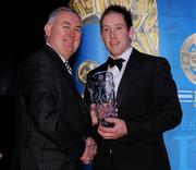 19 December 2009; Sean McCullagh, Derry, is presented with his Christy Ring Award by Uachtarán CLG Criostóir Ó Cuana. Christy Ring/Nicky Rackard/Lory Meagher Champion 15 & Rounder All-Star Awards 2009, Croke Park, Dublin. Photo by Sportsfile