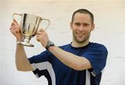 20 December 2009; John Rooney celebrates with the trophy after victory against Arthur Gaskin during the Irish Squash National Championships Finals. Fitzwilliam Lawn Tennis Club, Dublin. Picture credit: Pat Murphy / SPORTSFILE