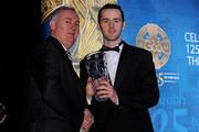 19 December 2009; Justin Kelly, Tyrone, is presented with his Lory Meagher Champion 15 Award by Uachtarán CLG Criostóir Ó Cuana. Christy Ring/Nicky Rackard/Lory Meagher Champion 15 & Rounder All-Star Awards 2009, Croke Park, Dublin. Photo by Sportsfile