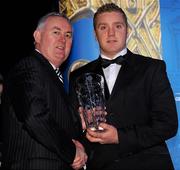 19 December 2009; Jamsie Donnelly, Donegal, is presented with his Lory Meagher Champion 15 Award by Uachtarán CLG Criostóir Ó Cuana. Christy Ring/Nicky Rackard/Lory Meagher Champion 15 & Rounder All-Star Awards 2009, Croke Park, Dublin. Photo by Sportsfile
