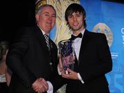 19 December 2009; Andrew Bell, Warwickshire, is presented with his Lory Meagher Champion 15 Award by Uachtarán CLG Criostóir Ó Cuana. Christy Ring/Nicky Rackard/Lory Meagher Champion 15 & Rounder All-Star Awards 2009, Croke Park, Dublin. Photo by Sportsfile