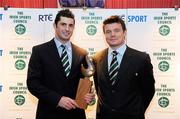 20 December 2009; Members of the Ireland Rugby team Rob Kearney, left, and Brian O'Driscoll, right, with the Team of the Year Award at the RTÉ Sports Awards. RTÉ Sports Awards 2009 in association with the Irish Sports Council, RTÉ Television, Donnybrook, Dublin 4. Picture credit: Pat Murphy / SPORTSFILE