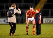 13 February 2016; Castlebar Mitchels supporter Keith Mellett, age 8, has his photograph taken with Barry Moran, by his mother Sarah, after the game. AIB GAA Football Senior Club Championship Semi-Final, Castlebar Mitchels, Mayo, v Crossmaglen Rangers, Armagh. Kingspan Breffni Park, Cavan. Picture credit: Stephen McCarthy / SPORTSFILE