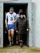 14 February 2016; Kilkenny kitman Rackard Cody makes his way to the pitch for the start of the second half alongside Waterford's Austin Gleeon, left, and Jake Dillon. Allianz Hurling League, Division 1A, Round 1, Waterford v Kilkenny. Walsh Park, Waterford. Picture credit: Piaras Ó Mídheach / SPORTSFILE