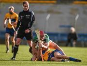 14 February 2016; Referee Sean Cleere looks on as Clare's Peter Duggan and Conor Doughan, Offaly, tussle on the ground. He later show the red card to both. Allianz Hurling League, Division 1B, Round 1, Clare v Offaly. Cusack Park, Ennis, Co. Clare. Picture credit: Ray McManus / SPORTSFILE