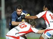 26 December 2009; Rob Kearney, Leinster, is tackled by Darren Cave, 13, and Timoci Nagusa, Ulster. Celtic League, Leinster v Ulster, RDS, Dublin. Picture credit: David Maher / SPORTSFILE