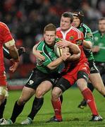 26 December 2009; Liam Bibo, Connacht, is tackled by Denis Hurley, Munster. Celtic League, Munster v Connacht, Thomond Park, Limerick. Picture credit: Ray McManus / SPORTSFILE