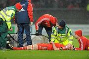 26 December 2009; Felix Jones, Munster, is attended to by medical staff after picking up an injury. Celtic League, Munster v Connacht, Thomond Park, Limerick. Picture credit: Diarmuid Greene / SPORTSFILE