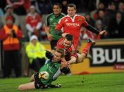 26 December 2009; The Connacht captain Gavin Duffy prevents Munster's Niall Ronan from scoring a try. Celtic League, Munster v Connacht, Thomond Park, Limerick. Picture credit: Ray McManus / SPORTSFILE