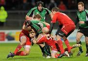 26 December 2009; Johnny O'Connor, Connacht, is tackled by Jean de Villiers, left, and Peter Stringer, Munster. Celtic League, Munster v Connacht, Thomond Park, Limerick. Picture credit: Diarmuid Greene / SPORTSFILE