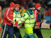 26 December 2009; The Munster full-back Felix Jones is stretchered off during the first half. Celtic League, Munster v Connacht, Thomond Park, Limerick. Picture credit: Ray McManus / SPORTSFILE