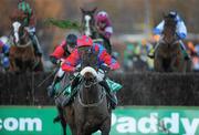 27 December 2009; Oscar Time, with Robbie Power up, on their way to winning the Paddy Power Steeplechase after jumping the last. Leopardstown Christmas Racing Festival 2009, Leopardstown Racecourse, Dublin. Picture credit: Matt Browne / SPORTSFILE
