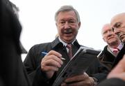 28 December 2009; The Manchester United manager Sir Alex Ferguson signing autographs at the races. Leopardstown Christmas Racing Festival 2009, Leopardstown Racecourse, Dublin. Photo by Sportsfile