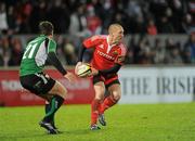 26 December 2009; Paul Warwick, Munster, is tackled by Ian Keatley, Connacht. Celtic League, Munster v Connacht, Thomond Park, Limerick. Picture credit: Ray McManus / SPORTSFILE
