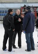 2 January 2010; Leinster head coach Michael Cheika and Connacht coach Michael Bradley in conversation with referee Peter Fitzgibbon before the referee postponed the game. The pitch remains covered but was deemed to be too hard under the covers. Celtic League, Connacht v Leinster, Sportsground, Galway. Picture credit: Ray McManus / SPORTSFILE