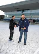 2 January 2010; Leinster head coach Michael Cheika and Connacht coach Michael Bradley shake hands after referee  Peter Fitzgibbon had postponed the game. The pitch remains covered but was deemed to be too hard under the covers. Celtic League, Connacht v Leinster, Sportsground, Galway. Picture credit: Ray McManus / SPORTSFILE