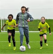 12 February 2016; Republic of Ireland Women's Internationals Aine O'Gorman and Rianna Jarrett helped to launch the Sportsdirect FAI Soccer Sisters Easter camps at the FAI National Training Centre. To register visit www.fai.ie/soccersisters. Pictured at the launch is Aine O'Gorman with Leagh McEvoy, left, age 11, and Maggie Adekunle, age 10, both from St. Patrick's S.N.S., Corduff, Blanchardstown, Dublin. FAI National Training Centre, Abbotstown, Dublin. Picture credit: David Maher / SPORTSFILE
