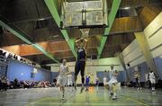 9 January 2010; Stu Robbins, UL Eagles, scores a slam dunk despite the efforts of Ian McLaughlin, left, and Mark Mitchell, Neptune. Nivea for Men Superleague Southern Conference, UL Eagles v Neptune, UL Arena, Limerick. Picture credit: Diarmuid Greene / SPORTSFILE