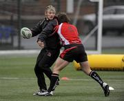 12 January 2010; Ulster's Jamie Smith is tackled by team-mate Isaac Boss during squad training ahead of their Heineken Cup game against Edinburgh on Friday night. Ashfield Boys School, Belfast, Co. Antrim. Picture credit: Oliver McVeigh / SPORTSFILE