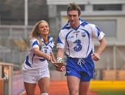 13 January 2010; Pictured at the unveiling of the new Waterford GAA strip for 2010 were Tony Browne, Waterford, and model Sarah Kavanagh. The new jersey was launched as part of a new two year sponsorship by 3, Ireland’s fastest growing network, of Waterford GAA, covering both the Hurling and Football codes and includes all grades from Minor to Senior inter-county teams over the next two years. Croke Park, Dublin. Picture credit: David Maher / SPORTSFILE