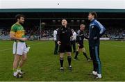 13 February 2016; Referee Barry Cassidy performs the pre-match coin toss with team captain Kevin Harney, left, Clonmel Commercials, and Darragh Nelson, Ballyboden St Enda's, before the game. AIB GAA Football Senior Club Championship, Semi-Final, Ballyboden St Enda's v Clonmel Commercials. O'Moore Park, Portlaoise, Co. Laois. Picture credit: Piaras Ó Mídheach / SPORTSFILE