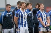 13 February 2016; Ballyboden St Enda's Daniel Davey and his team-mates stand for the National Anthem before the game. AIB GAA Football Senior Club Championship, Semi-Final, Ballyboden St Enda's v Clonmel Commercials. O'Moore Park, Portlaoise, Co. Laois. Picture credit: Piaras Ó Mídheach / SPORTSFILE