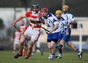 17 January 2010; Shane Casey, Waterford, in action against Ross Cashman, CIT. Waterford Crystal Cup, Waterford v CIT. Park Kilmacthomas, Kilmacthomas, Co. Waterford. Picture credit: Ken Sutton / SPORTSFILE